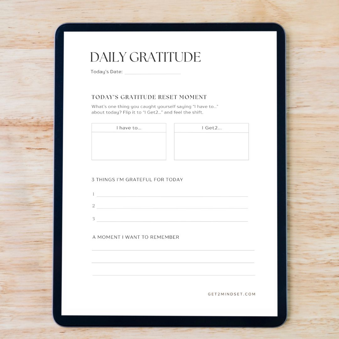Inside pages of the Get2Mindset Gratitude Journal featuring daily gratitude prompts