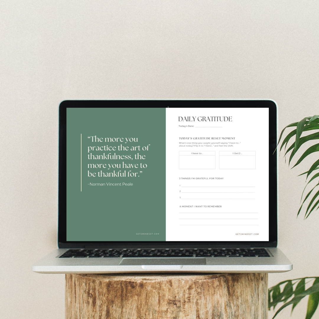 Inside pages of the Get2Mindset Gratitude Journal featuring daily gratitude prompts